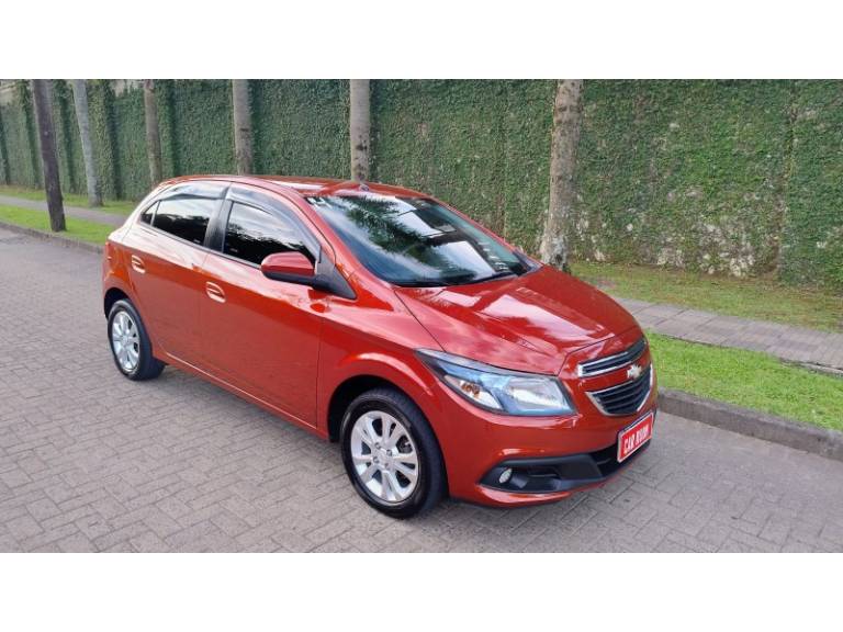 CHEVROLET - ONIX - 2014/2014 - Laranja - R$ 44.900,00